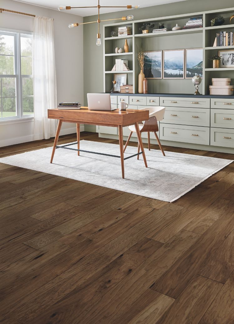light patterned area rug in a Sand City home office with hardwood floors