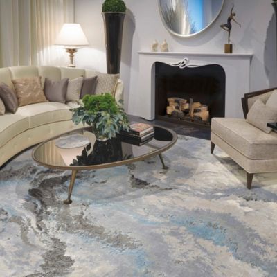 patterned area rug in a Sand City living room from Floor Store USA's Flooring America