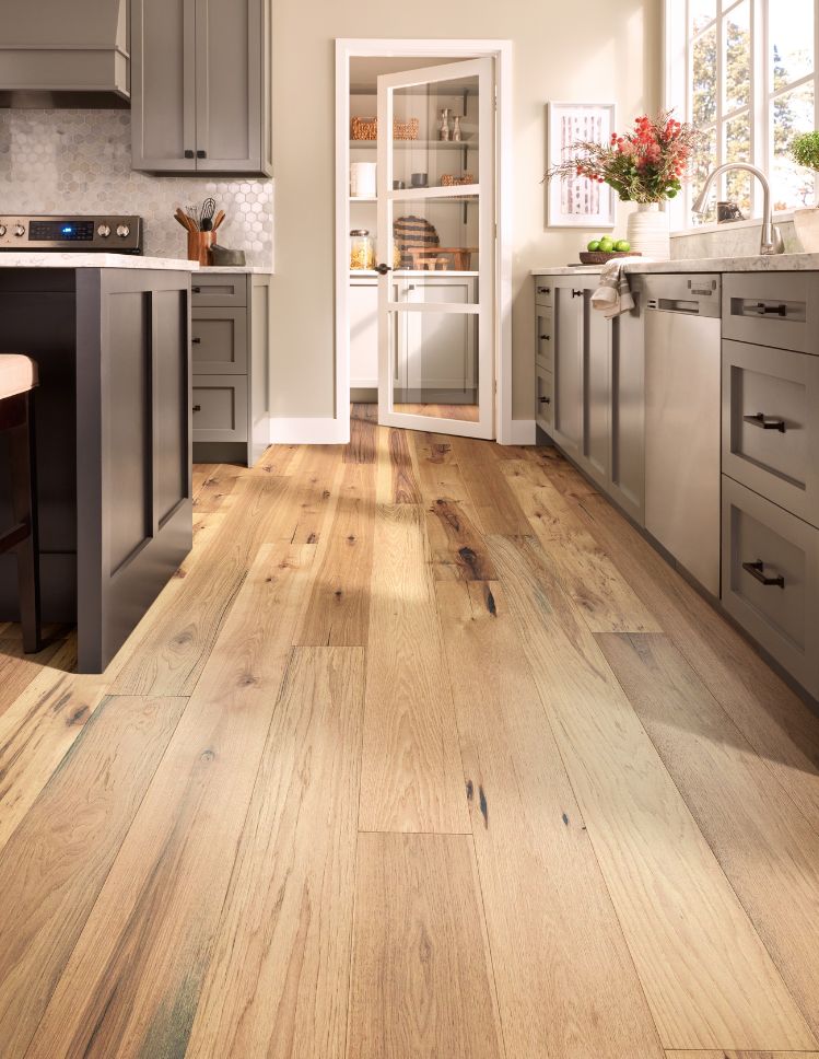 kitchen remodel with gray cabinets and light hardwood floors for Sand City homes
